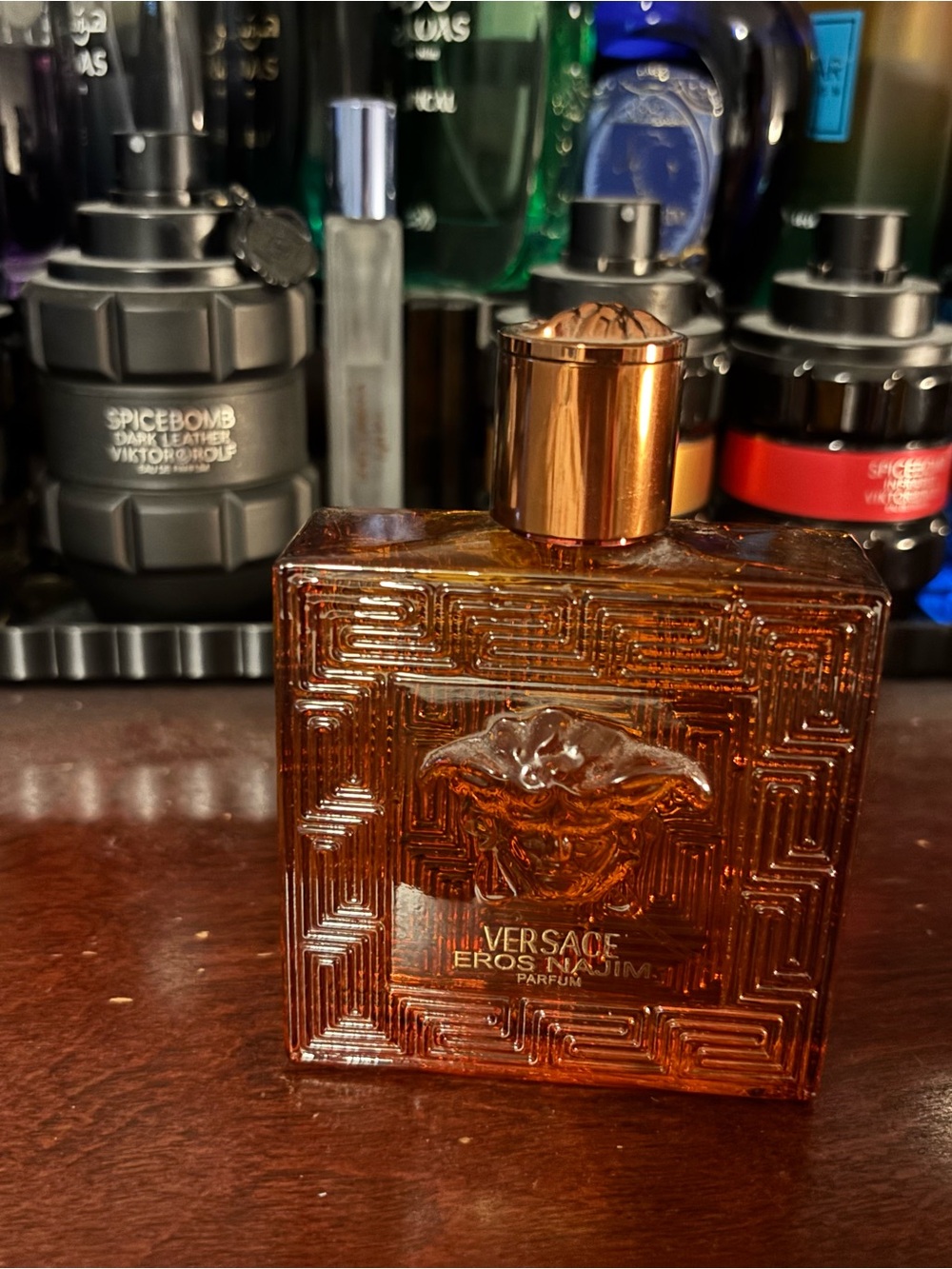 Versace Eros Flame Parfum Bottle in Amber and Gold full
